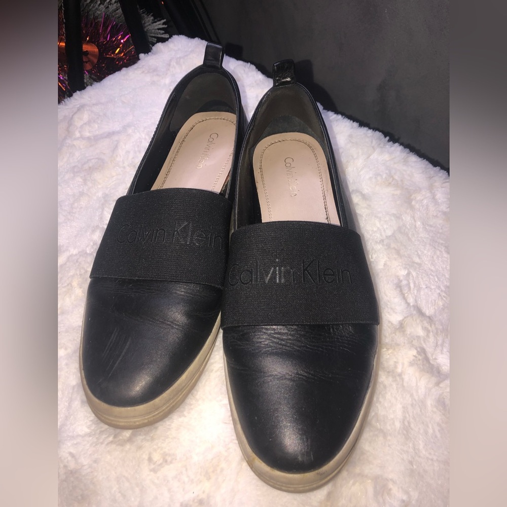 Calvin Klein black slip on sneakers